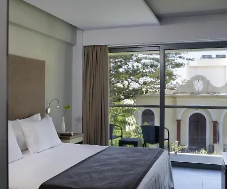 Отель Oktober Downtown Boutique